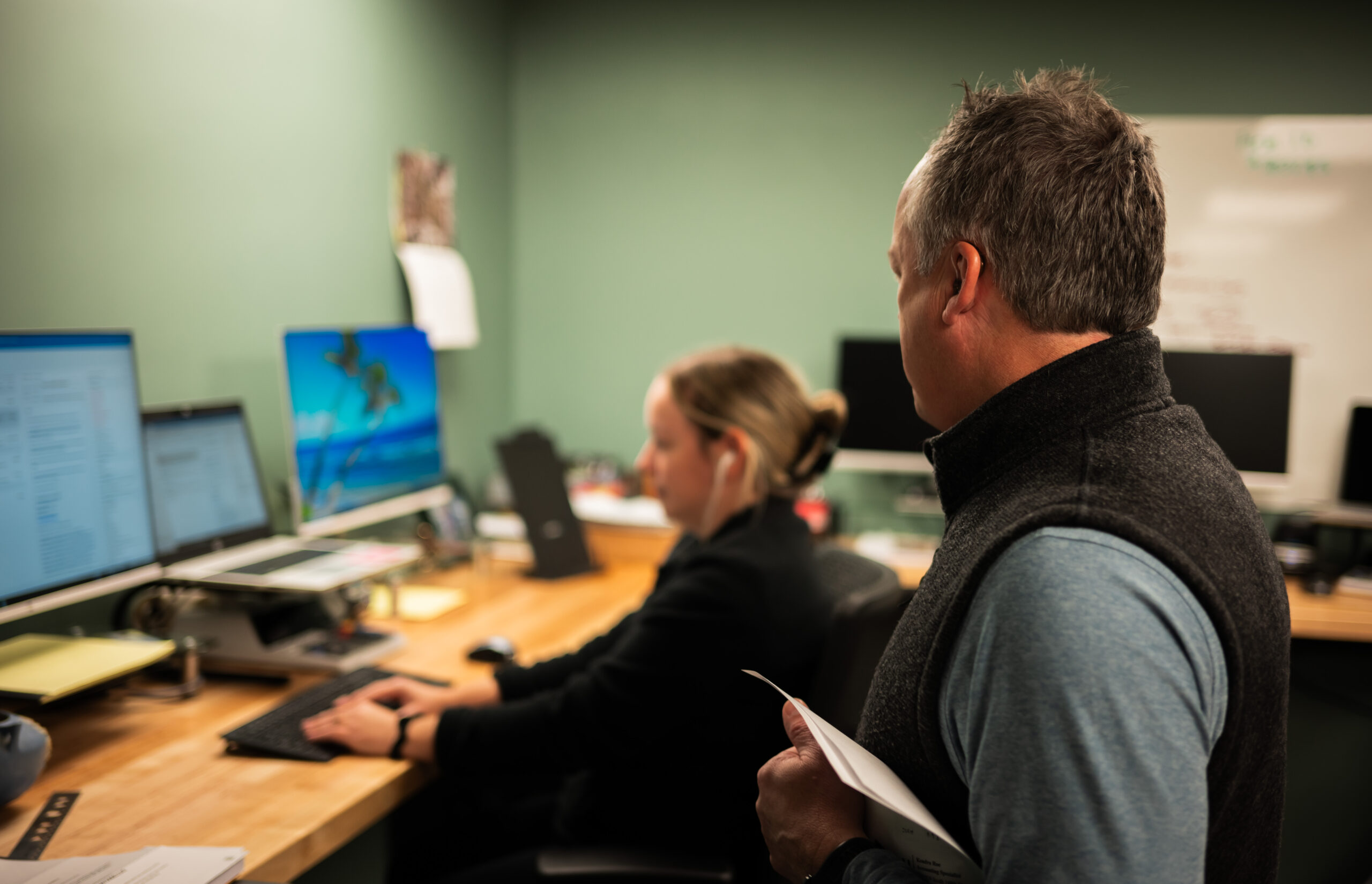 Image of experience tax team at desk.